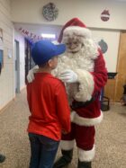 Santa and Paris Township boy chatting